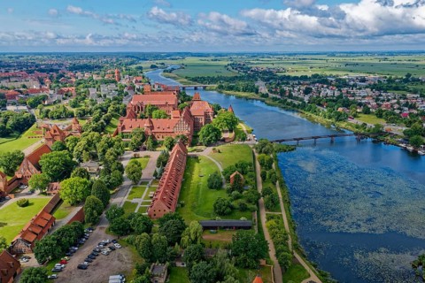 Aerial view of Malbork on the Nogat. The Malborku Castle, Zamek w Malborku, is a neo-Gothic lowland