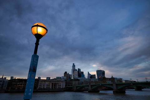 Glowing lantern in front of the river Thames, skyline, financial district, financial district,