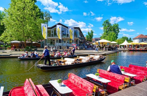 Tourists in boats on one of the branches of the Spree in the Spreewald, UNESCO Spreewald Biosphere