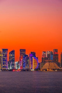 Doha, Qatar - january 8th, 2026: Doha skyline at night from the Corniche. Iconic illuminated