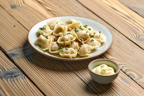 Boiled dumplings with beef on a plate