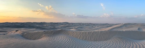Sunset, white sand dunes in the Khaluf desert, Oman