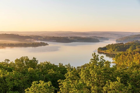 View from Julius-Mosen Tower of Pöhl Reservoir at sunrise with morning fog, Vogtland, Saxony,
