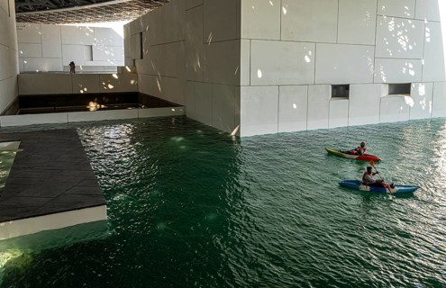 Interior design in Louvre Abu Dhabi, art museum by French architect Jean Nouvel, buildings on