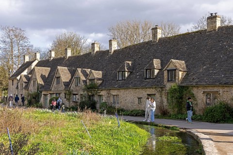 Houses, Arlington Row, Moat, Cotswold Stone, Bibury, The Cotswolds, England, Great Britain