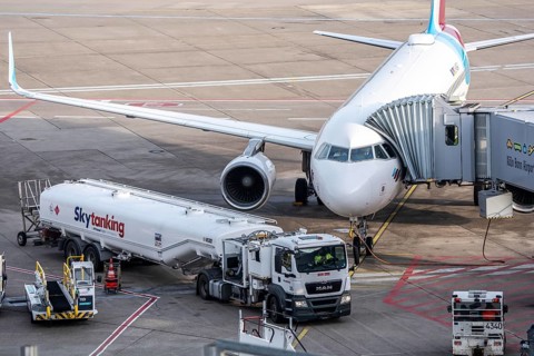 Refueling an aircraft after landing, in front of takeoff, air fuel, kerosene, Skytanking tank truck