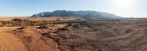 Aerial view, desert landscape on the Ugab River, behind Brandberg, Erongo, Damaraland, Namibia