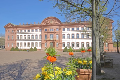 Baroque palace built in 1725 with palace square, floral decoration, imperial crowns, Palatinate