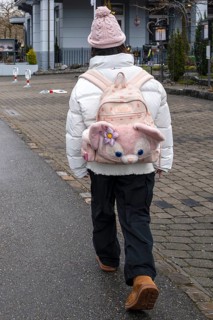 Schoolchild with backpack, Interlaken, Switzerland