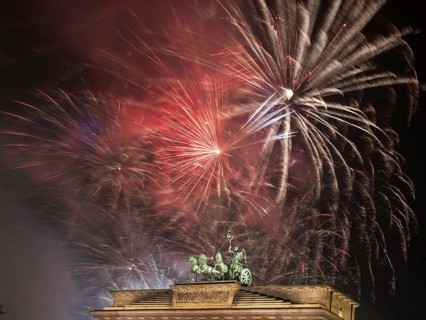 Fireworks over the Brandenburg Gate in Berlin, Germany, during New Year concert and celebrations