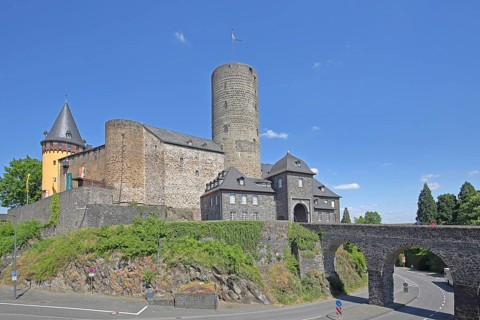 Genoveva Castle built in 1280 with Golo Tower and stone arch bridge, landmark, Eifel Museum, Mayen,