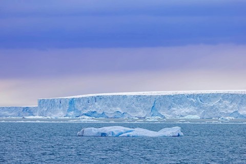 Brasvellbreen glacier from the ice cap Austfonna pouring fresh water into the Barents Sea,