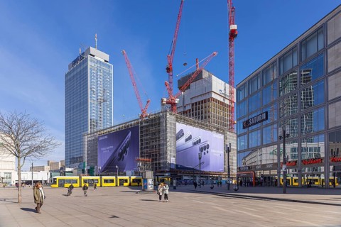 View of Alexanderplatz in Berlin by tram. Covivio Tower construction site. Berlin, Germany