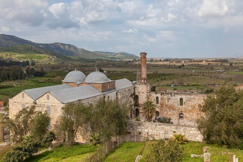 View of the Isabey Mosque, inner courtyard with minaret, Selçuk, Lycia, Turkey