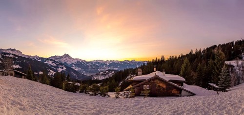 A stunning panoramic view of the Swiss Alps from Gryon, Vaud, showcasing the majestic Dents du Midi