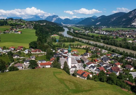 Drone image, view of village with parish church, Breitenbach am Inn, Inntal, Tyrol, Austria