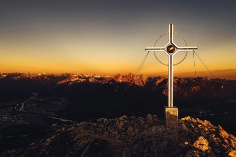 Summit cross, sunrise hiking tour on the Säuling in the Allgäu in Bavaria, Germany