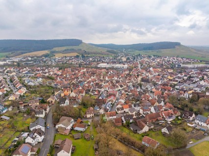 View of urban settlement with red roofs and green hills in the background, Großbottwar, Ludwigsburg