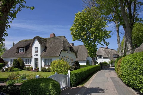 Frisian traditional house with straw-thatched roof at Föhr, Foehr island, North Frisia, Germany