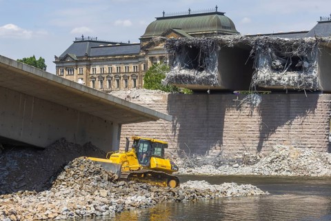 Demolition work continues following the partial collapse of the Carola Bridge. Construction of a