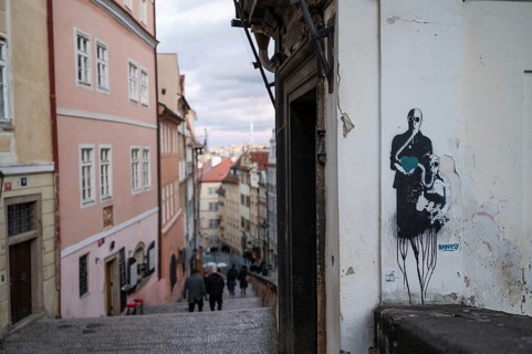 PRAGUE, CZECHIA - MARCH 25, 2023: Banksy graffitti on the wall.