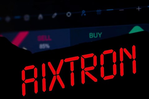 AIXTRON logo is displayed on smartphone. Aixtron SE is a European multinational technology company.