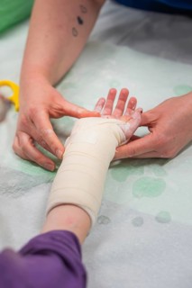 A child receives a bandage on his arm, medical environment, caring care, hospital opening, Calw,