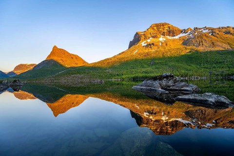 Picturesque mountain landscape in the Innerdalen high valley with Innerdalstårnet peak, mountain