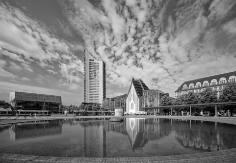 Morning atmosphere, Leipzig Augustusplatz with Gewandhaus, Mendebrunnen, city skyscraper and