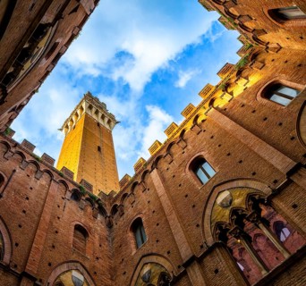 Palazzo Pubblico, Gothic-style town hall with tower, frog-eye view, Siena, Tuscany, Italy
