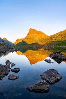 Picturesque mountain landscape with Innerdalstårnet peak in the Innerdalen high valley, mountain