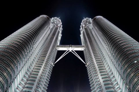 Petronas Towers, KLCC Twin Towers, interlinked 88-storey supertall twin skyscrapers illuminated at