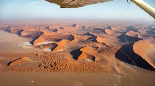 Aerial view from the plane, red sand dunes of the Namib Desert, Namib Naukluft Park, Namibia