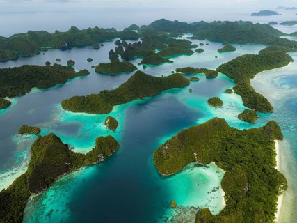 Aerial view of tropical islands and turquoise lagoons, Wayag Archipelagio, West Papua, Indonesia