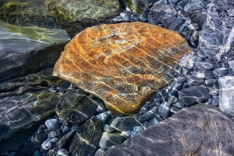 Rocks and stones in the Barents Sea, Söröya, Finnmark, Norway, May 2019
