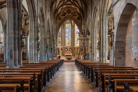 Interior, central nave of the Holy Cross Münster with the complex mesh and star rib vault, which