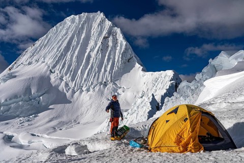 High camp with tent and mountaineer, tent camp, high camp at 5500 m above Alpamayao, southwest