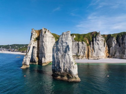 Aerial view of the Porte d'Aval rock formation, a landmark on the chalk coast with the distinctive
