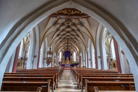 Interior with Gothic mesh vault and high altar, Holy Trinity parish church, founded in 1364,