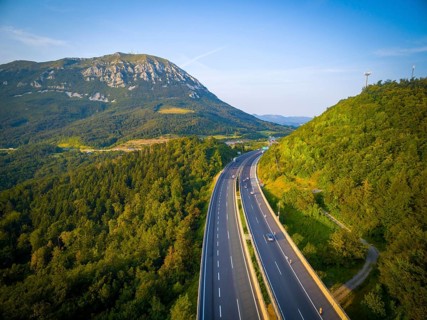 Dramatic aerial view of mountains and roads in Slovenia. Central Europe. Slovenia