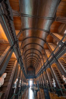 High vaulted ceiling in a historic library with elegant wood structure, Trinity Collage, Dublin,