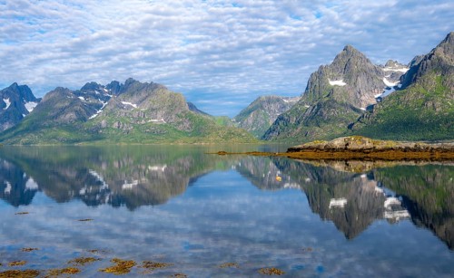 Picturesque fjord landscape at Raftsund fjord, mountains reflected in water, Vesterålen, Norway