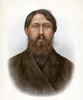 Russian, mature Russian with his characteristic thick, brown full beard and dark hair. He is