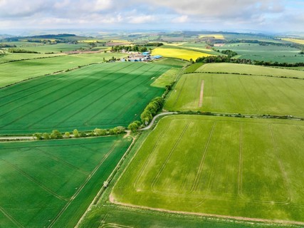 Drone photo of agricultural fields with blooming rape seed at the sottish border near Oxnam,