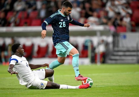 Deniz Undav GER (26) tackle, action against Tony Miettinen FIN (04) international football match,