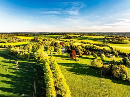 Fields and Farms over Horsebridge nad Stockbridge from a drone, Hampshire, England, United Kingdom