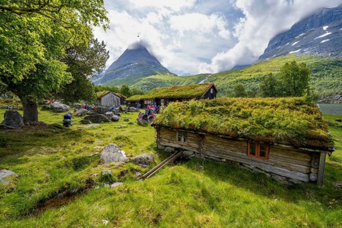 Traditional houses with grass roofs, Renndølsetra, Innerdalen high valley, Innerdalstårnet mountain