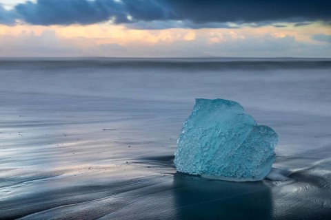 Ice chunks on the black beach, lava beach, glacier ice, sea, winter, sunset, Diamond Beach