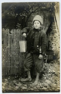 Polish boy, Vilnius, Lithuania, beggar, poverty, poverty, hunger, orphan, a boy leaning against a
