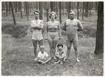 Bathing, swimwear, children, men, woman, forest, A family in bathing suits standing in a clearing
